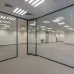 Modern,Office,Space,With,Light,Walls,And,Floor,,And,Glass