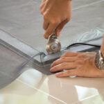 Man,Install,Mosquito,Net,Wire,Screen,On,House,Window,Protection